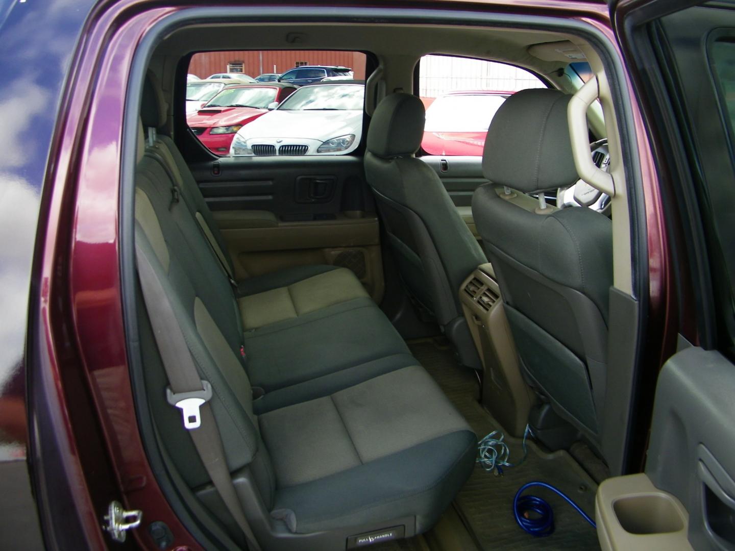 2007 Maroon /Grey Honda Ridgeline RT (2HJYK16267H) with an 3.5L V6 SOHC 24V engine, 5-Speed Automatic Overdrive transmission, located at 4000 Bee Ridge Road, Sarasota, FL, 34233, (941) 926-0300, 27.298664, -82.489151 - Photo#9